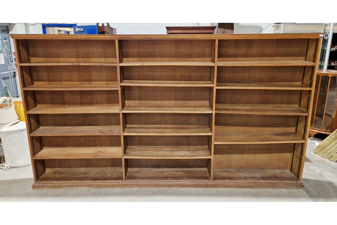 Unusually large oak bookcase, three section having 14 adjustable shelves, 172cm high x 310cm wide - Image 1 of 23