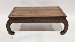 20th century Oriental hardwood coffee table of rectangular form, with carved geometric decoration to