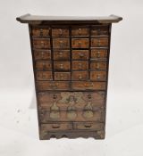 20th century Oriental spice cabinet having various drawers of various sizes and shapes, 76cm high