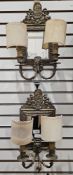 Pair probably French brass girandole wall mirrors, each having bevelled rectangular plate, foliate