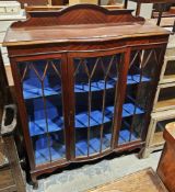 Reproduction mahogany glazed display cabinet, the single door opening to reveal two adjustable