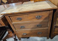 Late 19th century oak Arts and Crafts chest of drawers, with three long graduating drawers and