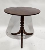 Late 19th/early 20th century mahogany tilt-top table of circular form, on tripod base, 70cm high x