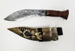 Nepalese Gurkha kukri knife, brass-mounted, engraved with foliate motifs, wooden handle and brass,