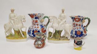 LOT WITHDRAWN Three 19th century Mason's Ironstone Hydra jugs, a pair of Staffordshire pottery