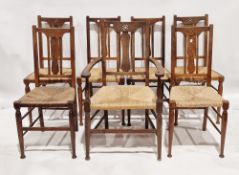 Set of seven early 20th century oak dining chairs in the Arts and Crafts style comprising six