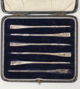 Set of six early 20th century silver cocktail sticks in the form of oars, hallmarked Birmingham 1925
