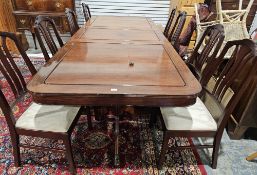 Regency style mahogany twin pedestal rectangular dining table and eight Parker Knoll 'Regent' dining