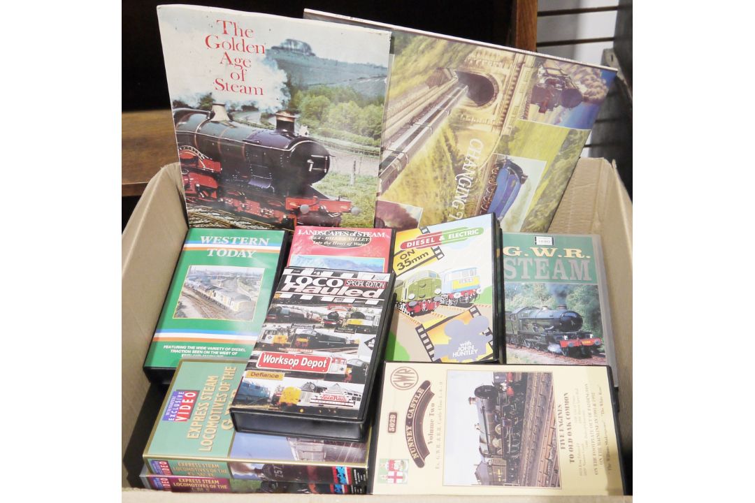 Assorted railway items to include the Golden Age of Steam cigar card album, the World of Railways