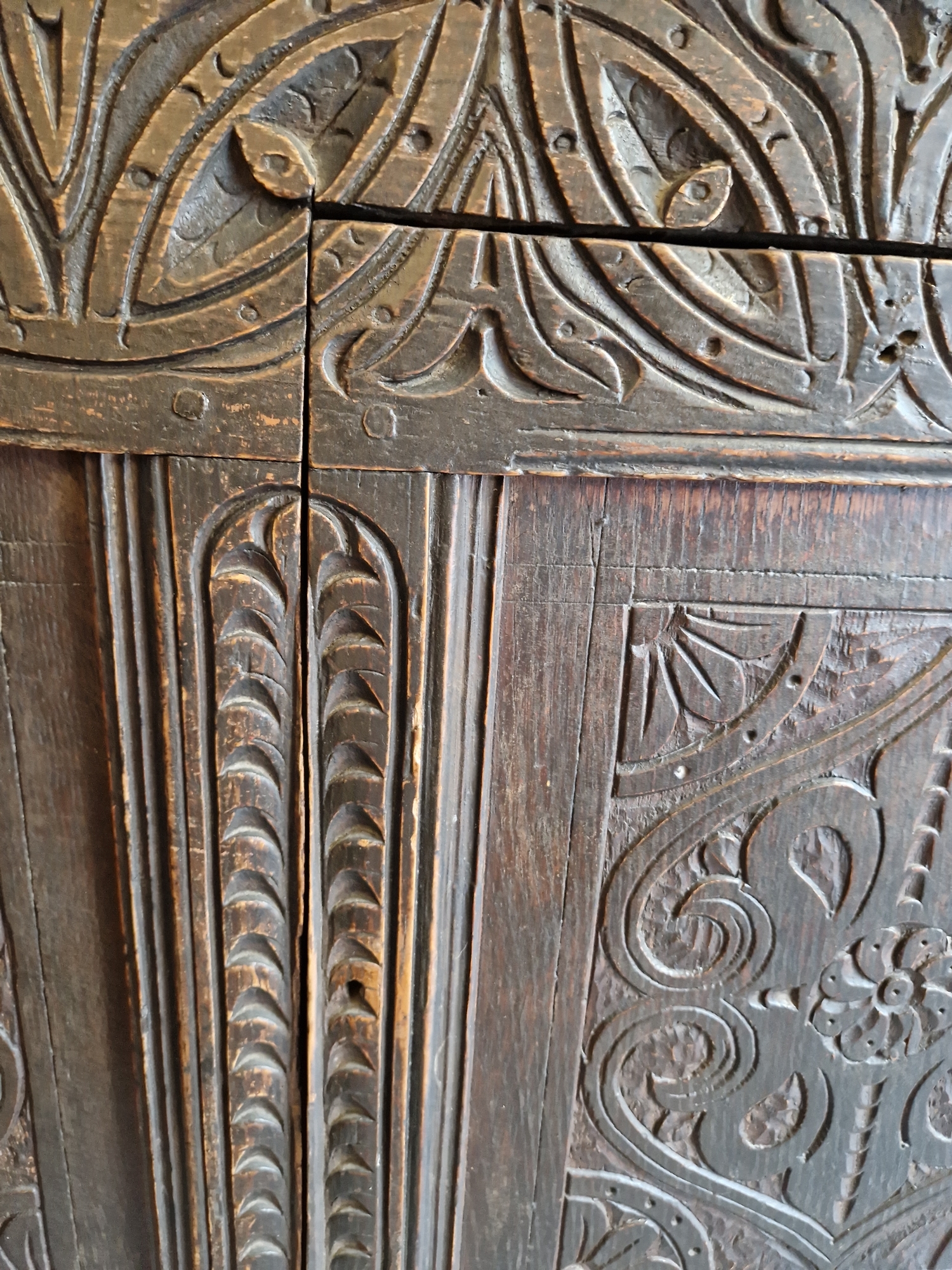 Antique oak coffer, the planked top with lunette frieze, the three-framed panel front scroll - Image 12 of 27