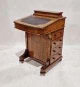 Victorian mahogany davenport with inlaid marquetry motifs and stringing, the lid opening to show two