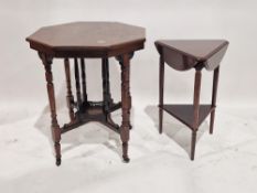 Early 20th century stained mahogany occasional table of octagonal form, raised on turned legs with