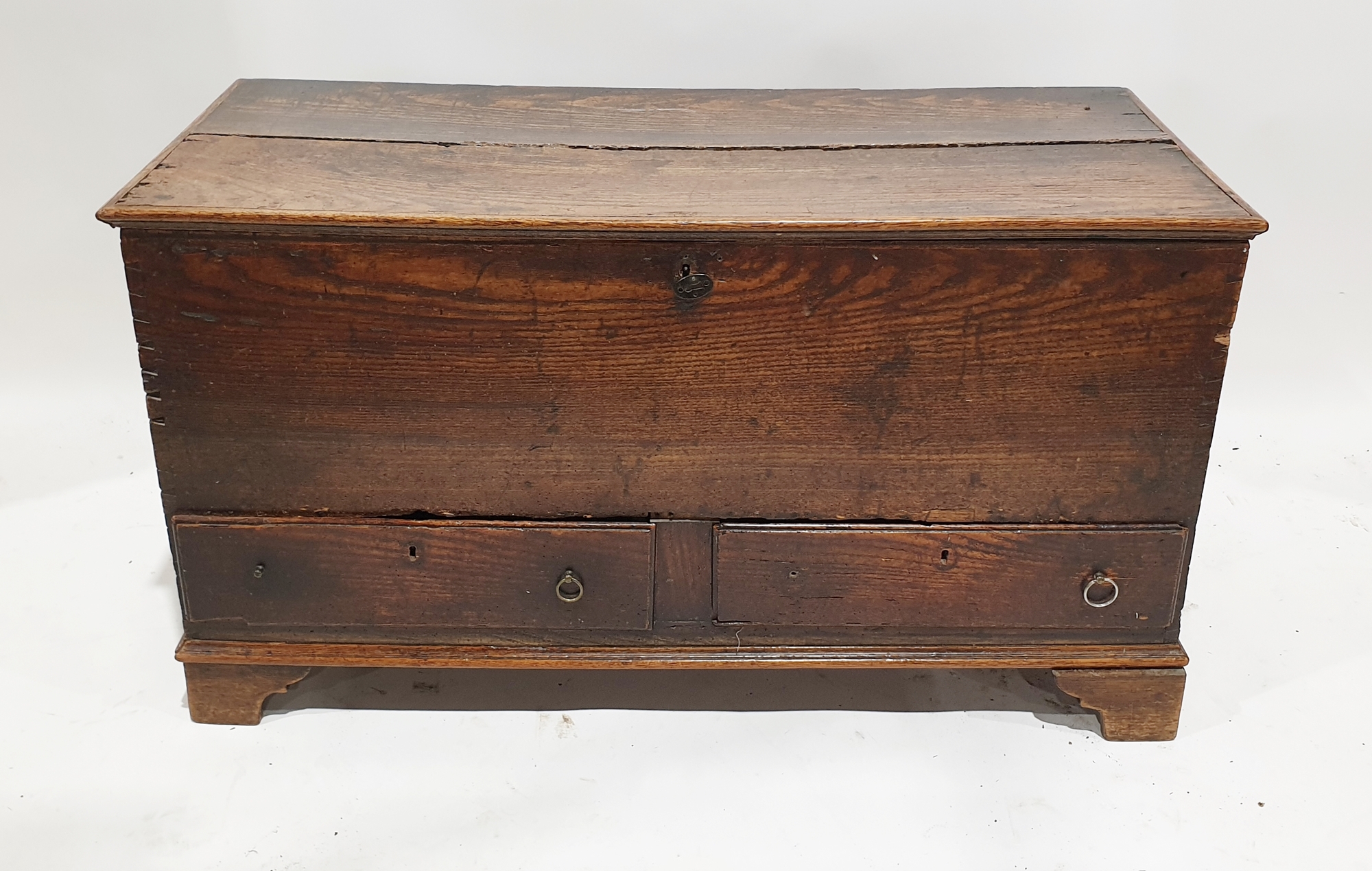 Antique oak dower chest of rectangular form with two short drawers to the front, raised on bracket