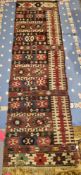 Early 20th century kilim, probably Turkish, woven with geometric bands in red, brown and blue tones,