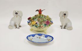 Pair of Staffordshire pottery models of dogs, late 19th century, each applied with extruded play