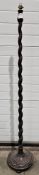 Victorian mahogany barleytwist standard lamp, on circular moulded base and bun feet, adapted for