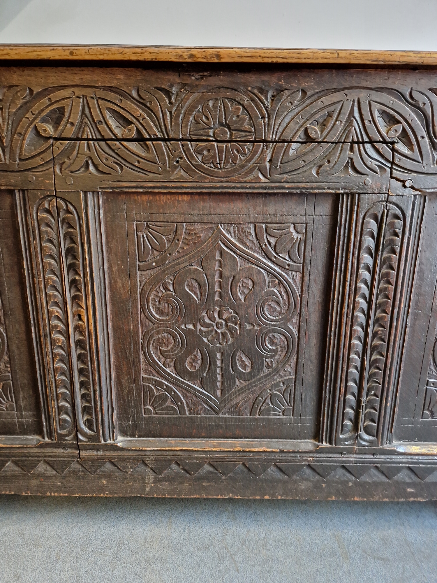 Antique oak coffer, the planked top with lunette frieze, the three-framed panel front scroll - Image 10 of 27