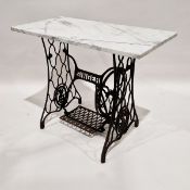 Cast iron Singer sewing machine treadle base, adapted into a side table, with a marble top, 75cm