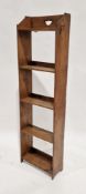 Early 20th century oak narrow bookshelf of five-tiers, with attached label 'Solomon Bros,