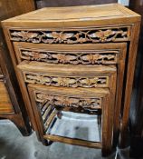 20th century Asian hardwood carved nest of three occasional tables, each fan-shaped with pierced