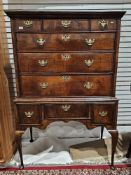 George II walnut chest on stand, circa 1730, the moulded top above one long and two short drawers