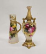Royal Worcester blush ivory ground baluster two-handled vase with dolphin handles, raised on