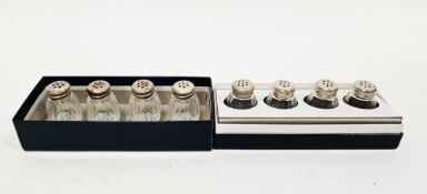 Two sets of silver-mounted glass salt pots by Cardilhac, each comprising four pieces, in original