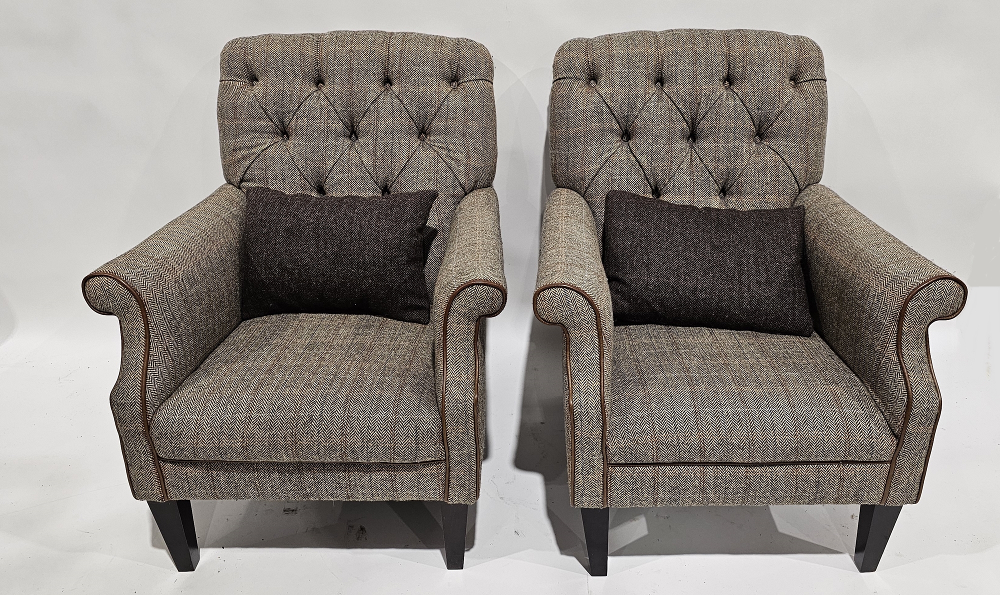 Pair of modern John Lewis buttonback upholstered armchairs, each upholstered in herringbone-