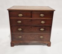 19th century mahogany chest of two short over three long drawers, each with brass handles, raised on