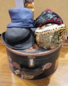 Two 1950's feather hats, one bearing possibly pheasants feathers, the other possibly jackdaw