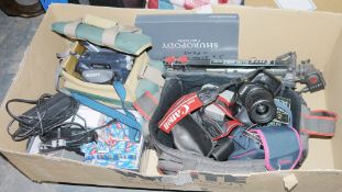 Cameras and accessories to include a Canon EOS 850 film camera, a Stips HL-31Q, a quantity of