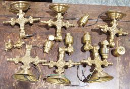 Assorted brass wall lights, each in the Victorian-style cast with scrolling branch and flowerheads