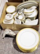 Electric Salvador Dali-style clock, a contemporary Indian brass candle holder, a part tea and dinner