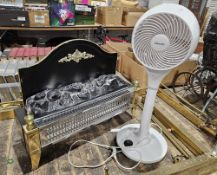 Two-bar radiant electric fire with coal-effect light and a pedestal fan by Devola (2)