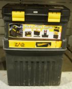 Mobile stacking work centre/toolbox containing a selection of tools and fixings