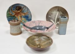 Raymond Everett (b.1926) a studio pottery plate with floral decoration on speckled brown ground,