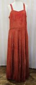 A 1930s orange lace overlay dress, embroidered detail, full skirt, side zip fastening Condition