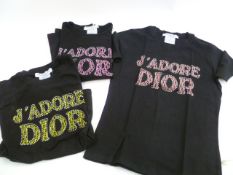 An assortment of designer T-shirts - to include Christian Dior, Yves Saint Laurent, Dolce et