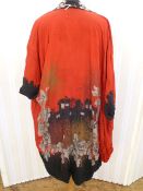 A 1920s silk reversable kimono, the one side black printed with pink floral decorations, the other