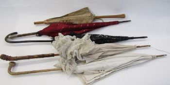 Edwardian cane and silver-handled striped fabric folding umbrella, the handle mounted with