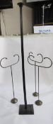 Black painted wood column hat stand and three C-shaped metal scarf stands (4)
