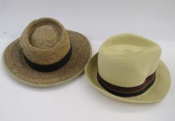 Two vintage panamas, a vintage straw hat, two rather worn top hats, one marked Locke & Co, the other