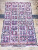 Turkish wool rug, four rows of geometric star designs in black, pink, cream and grey, 230cm x