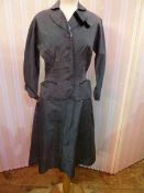 A 1940's fitted jacket, grey with pink and red embroidered detail, labelled  Original Prestige