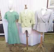 A 1950's yellow fitted jacket printed with black detail three quarter length sleeves with cuffs