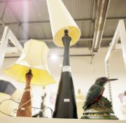 Turned wood table lamp carved with far eastern garden scene, a black 'Dewdrop' lamp and shade,