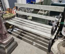 Wood and wrought iron garden bench