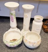 Two ceramic jardinieres, bowls on matching stands, one decorated with lilacs, the other with roses