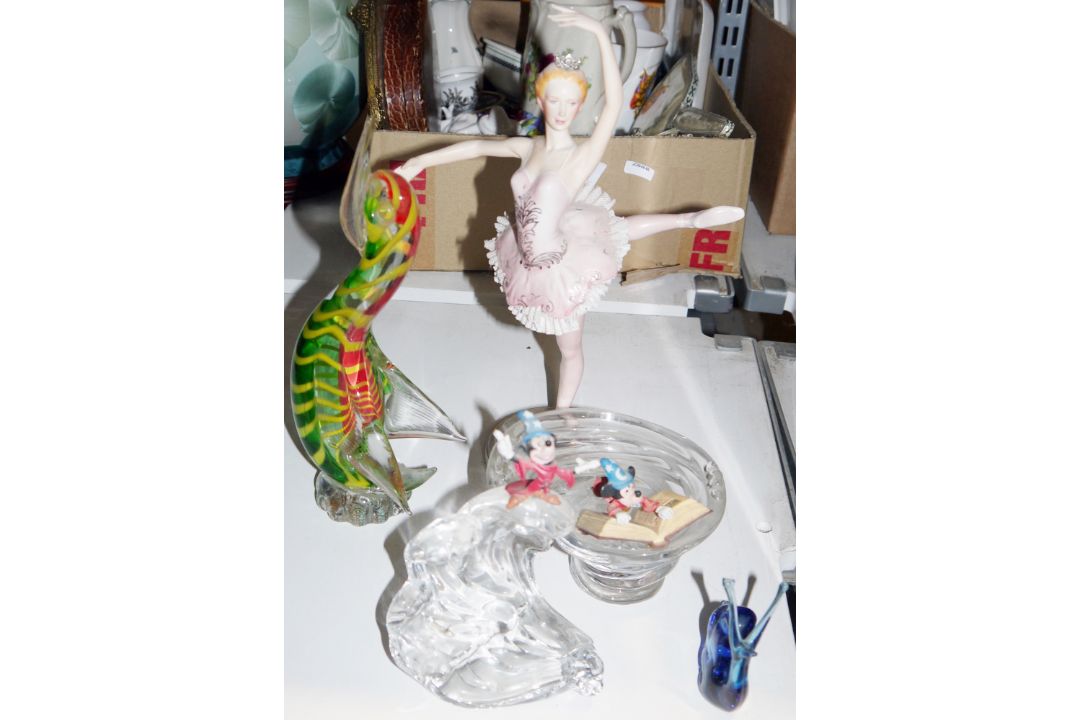 Disney Austrian glass paperweight of Mickey Mouse from Fantasia riding a wave formed in glass and