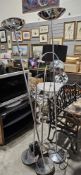 Four chrome-effect floor-standing lamps, two with dished tops and two further (4)